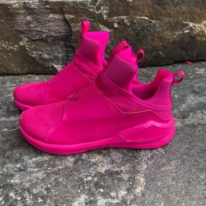 Neon pink puma shoes